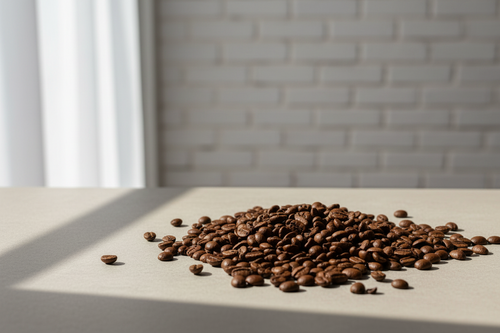 Ethiopia Yirgacheffe light roast beans on pale oak against a whitewashed brick wall