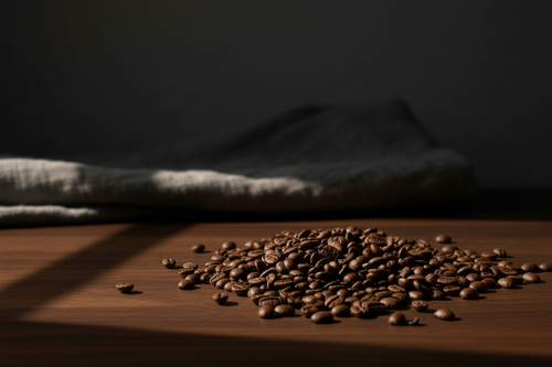 Ethiopia Yirgacheffe dark roast espresso beans on a walnut table in low light
